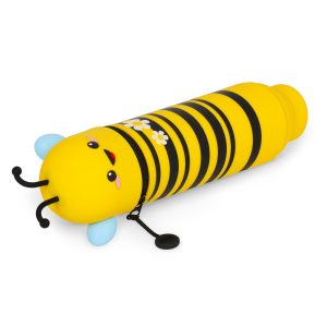 An angled product shot of a cute, bee-shaped pencil case by Legami, isolated on a white background. The yellow and black striped pencil case is lying down, slightly angled with the head to the left of the image. The top part of the case, which acts as the bee's head, is also yellow and features a kawaii-style face. The pencil case is zipped closed with the pull tab lying on the right of the pencil case. The body of the pencil case features two white daisies with yellow centres.