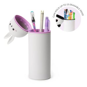 A product shot of a cute, grey, bunny-shaped pencil case by Legami, isolated on a white background. The pencil case is standing upright with its zipped lid open. The lid, which forms the bunny's head, is shown dangling at the side with a kawaii-style face. The open pencil case reveals a selection of stationery inside, including a pen with a bunny topper. There is an inset circular image in the top right corner showing a different open pencil case. A white banner over the circle reads "CAN HOLD UP TO 15 ERASABLE PENS!".